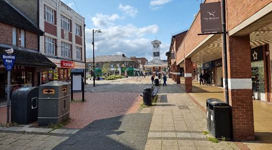 Bedford Street before the works and an artist’s impression of the finished scheme