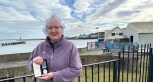 Dorothy Brownlee holds the silver medal given to her grandfather after the brave rescue of the Rohilla ship by Tynemouth RNLI