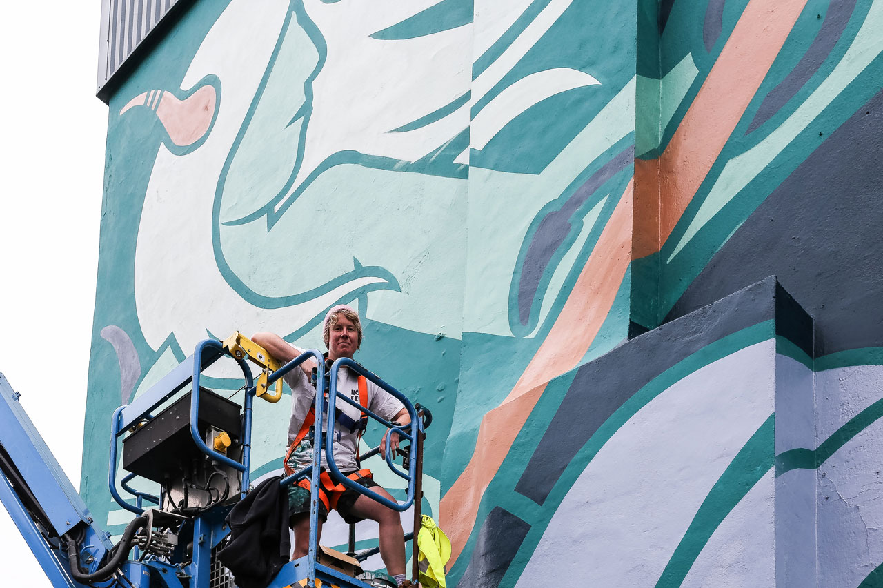 Oceanus - KMG's wall mural for Elevation 2 KMG working on Oceanus, wall mural for Elevation Mural Festival. Photo by Wayne Bordoli