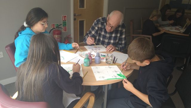 Creating artwork, a talented group of young people and older residents who have collaborated on a special art project are set to see their work go on display.