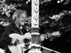 Jed Grimes: A lifetime of music and a new chapter at Seven Stars Black and white photo of Jed Grimes playing acoustic guitar