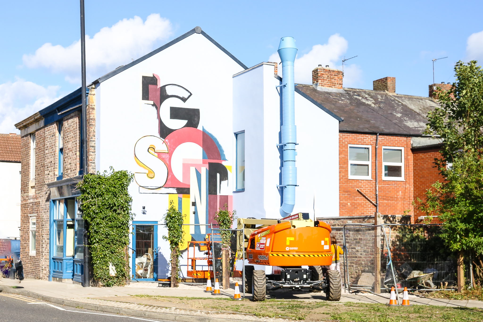 I Beg That Sound - Ricky Also’s wall mural for Elevation 7 I Beg That Sound by Ricky Also work in progress, Brandling Terrace. Photo by Wayne Bordoli