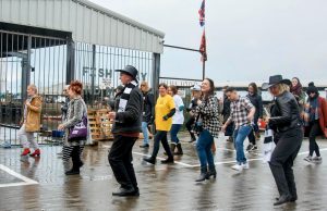 Flash Mob Takes Over North Shields Fish Quay with “The Geordie Line Dance” Despite Pouring Rain